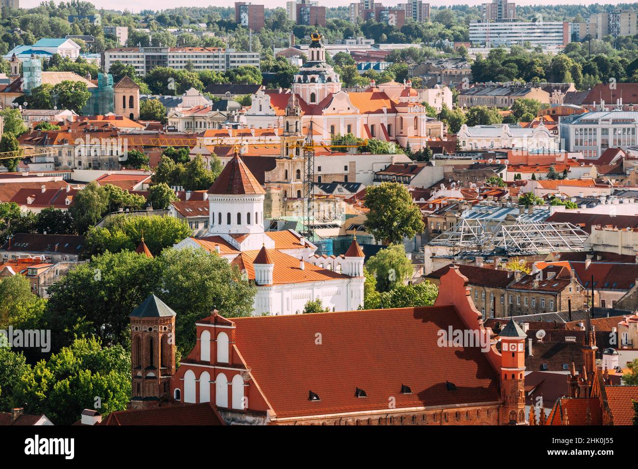 Vilnius, Lithuania. View Of Church Of St. Casimir, Church Of Blessed Virgin Mary Of Consolation, Cathedral Of Theotokos, Church Of St. Francis And Stock Photo