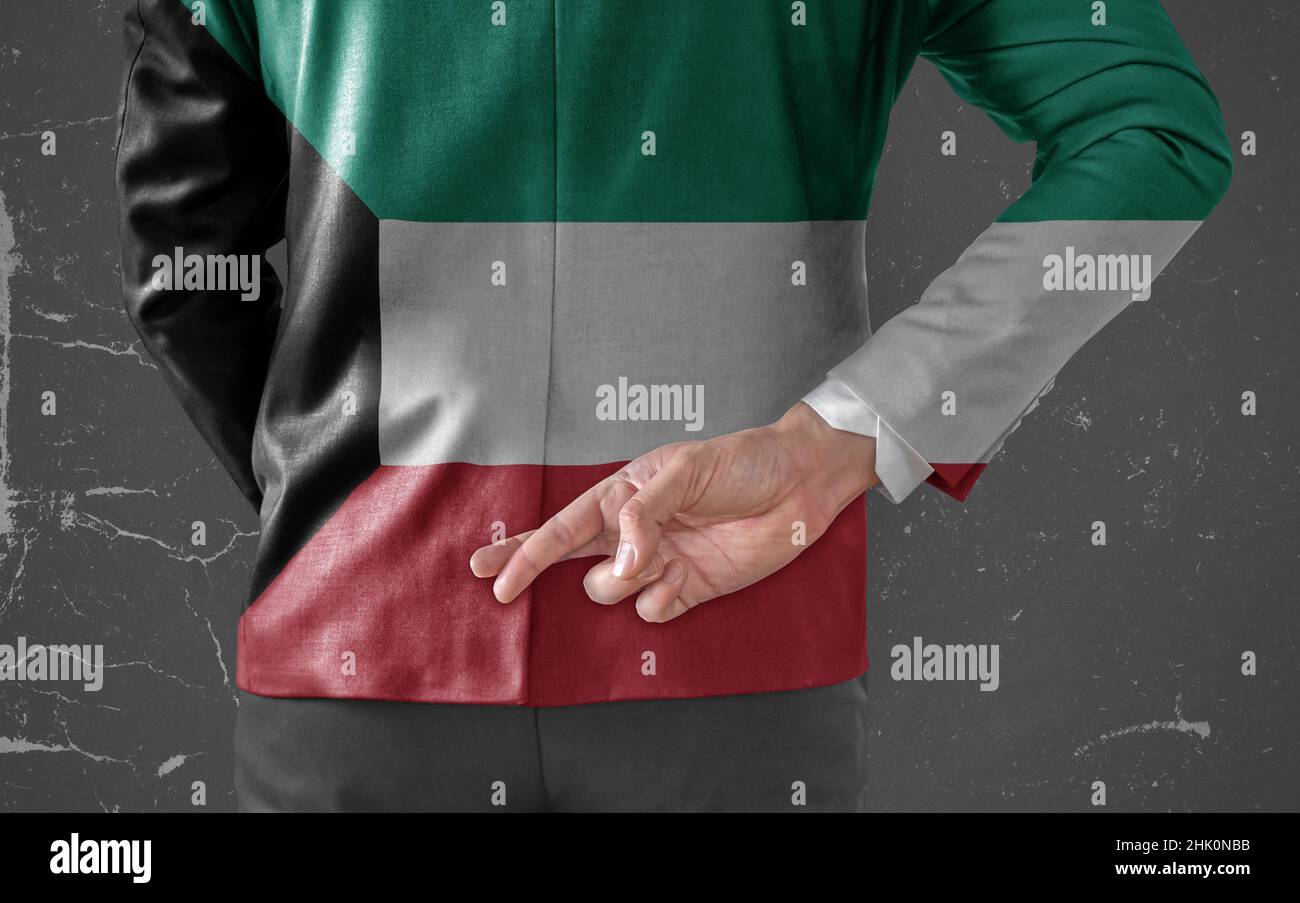 Businessman Jacket with Flag of Kuwait with his fingers crossed behind