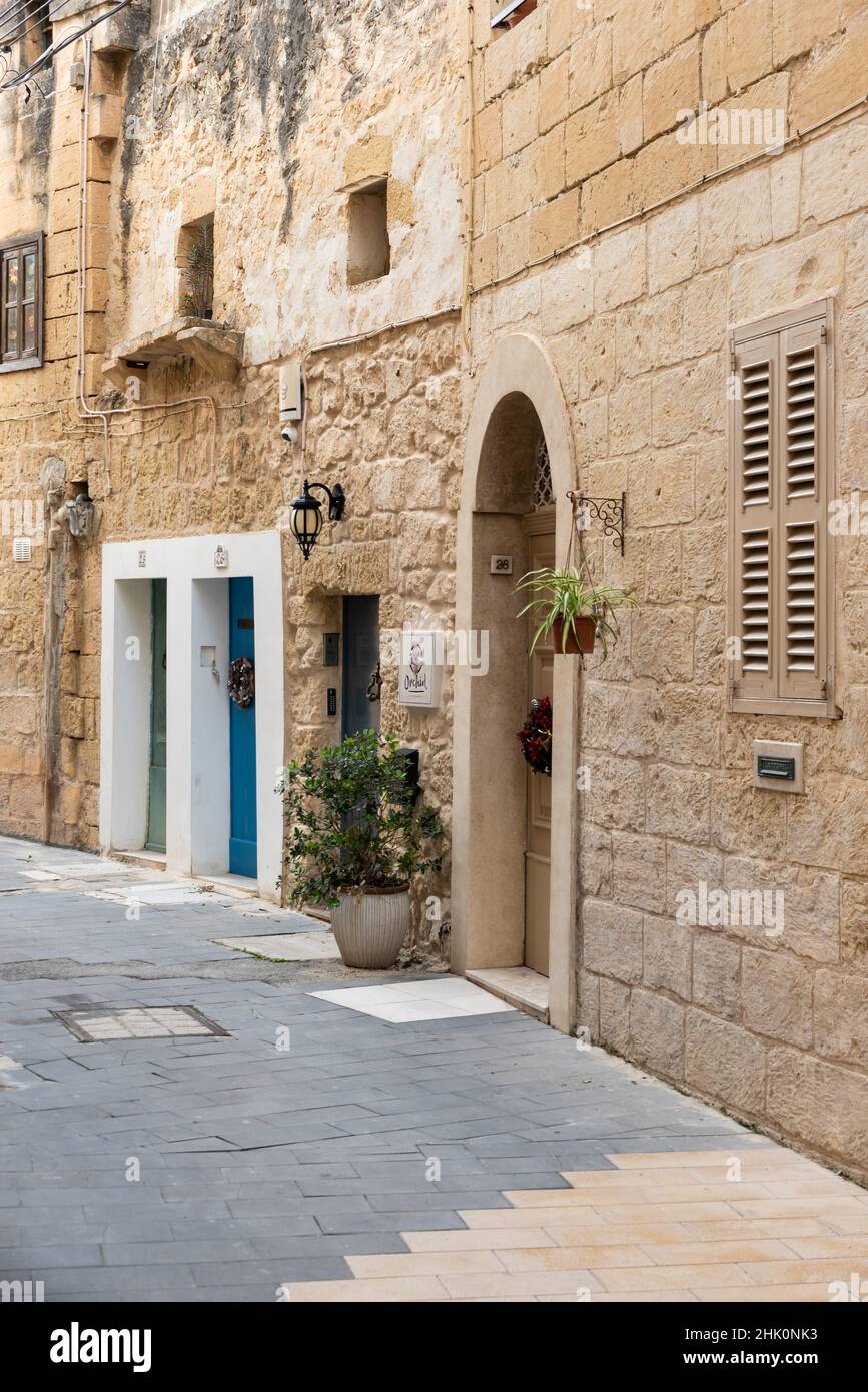 Rabat, Malta Decorated traditional houses in a narrow street Stock