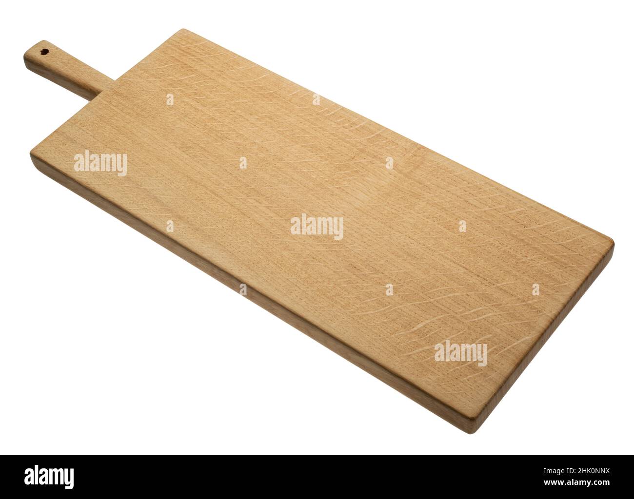 Chopping board or cutting board. A cut out against a white background. Food preparation cutting surface used in the kitchen. Stock Photo