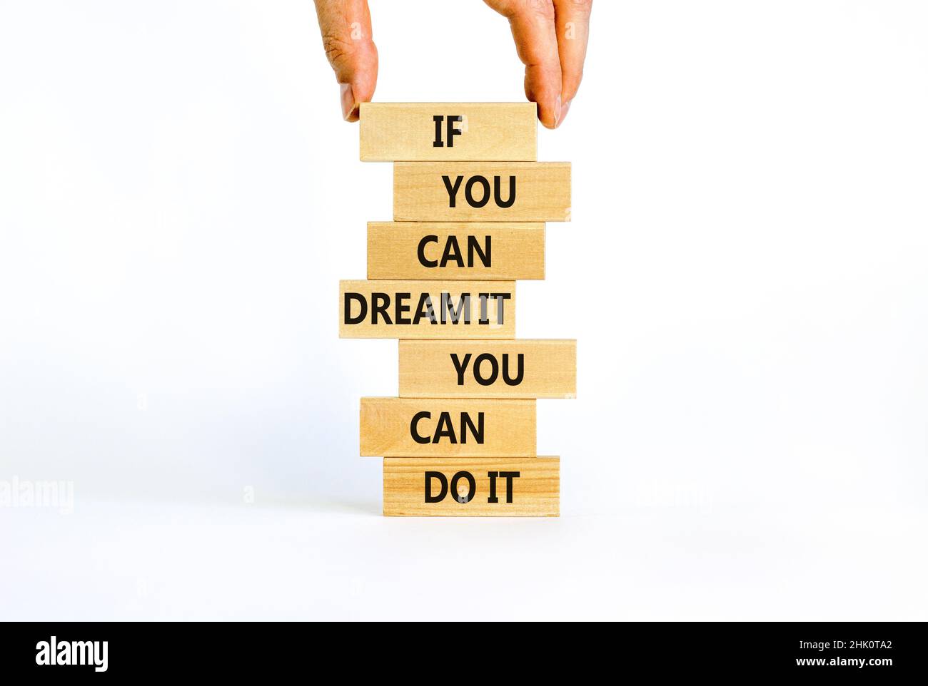 Dream and do it symbol. Wooden blocks with words If you can dream it you  can do it. Beautiful white background, copy space. Businessman hand.  Business Stock Photo - Alamy