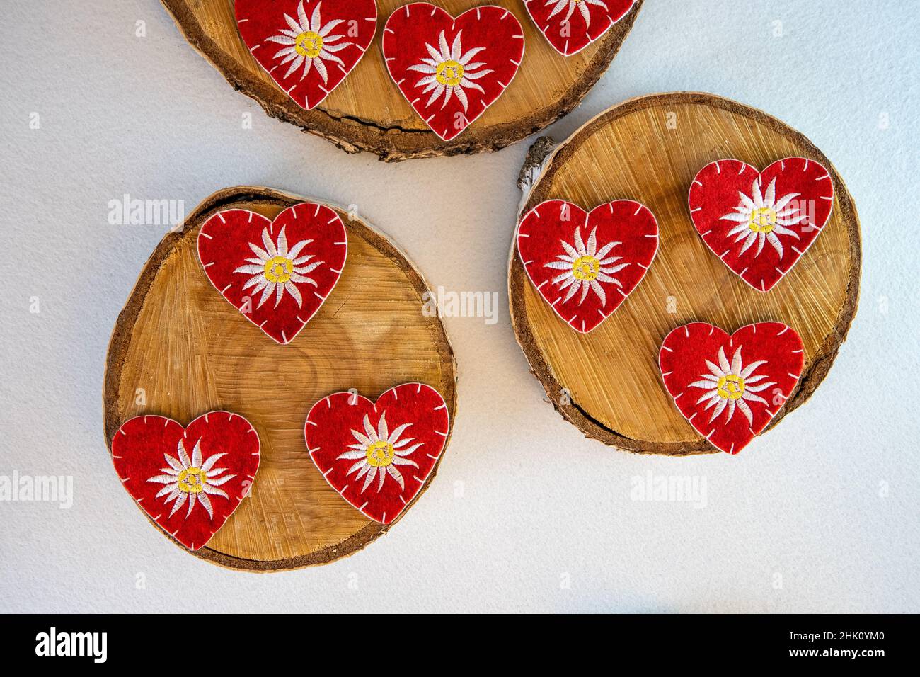 red hearts embroidered with edelweiss Stock Photo