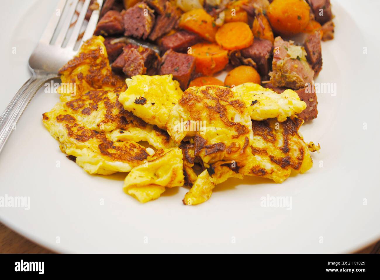 Corned Beef Hash with a Side Dish of Scrambled Eggs Stock Photo Alamy