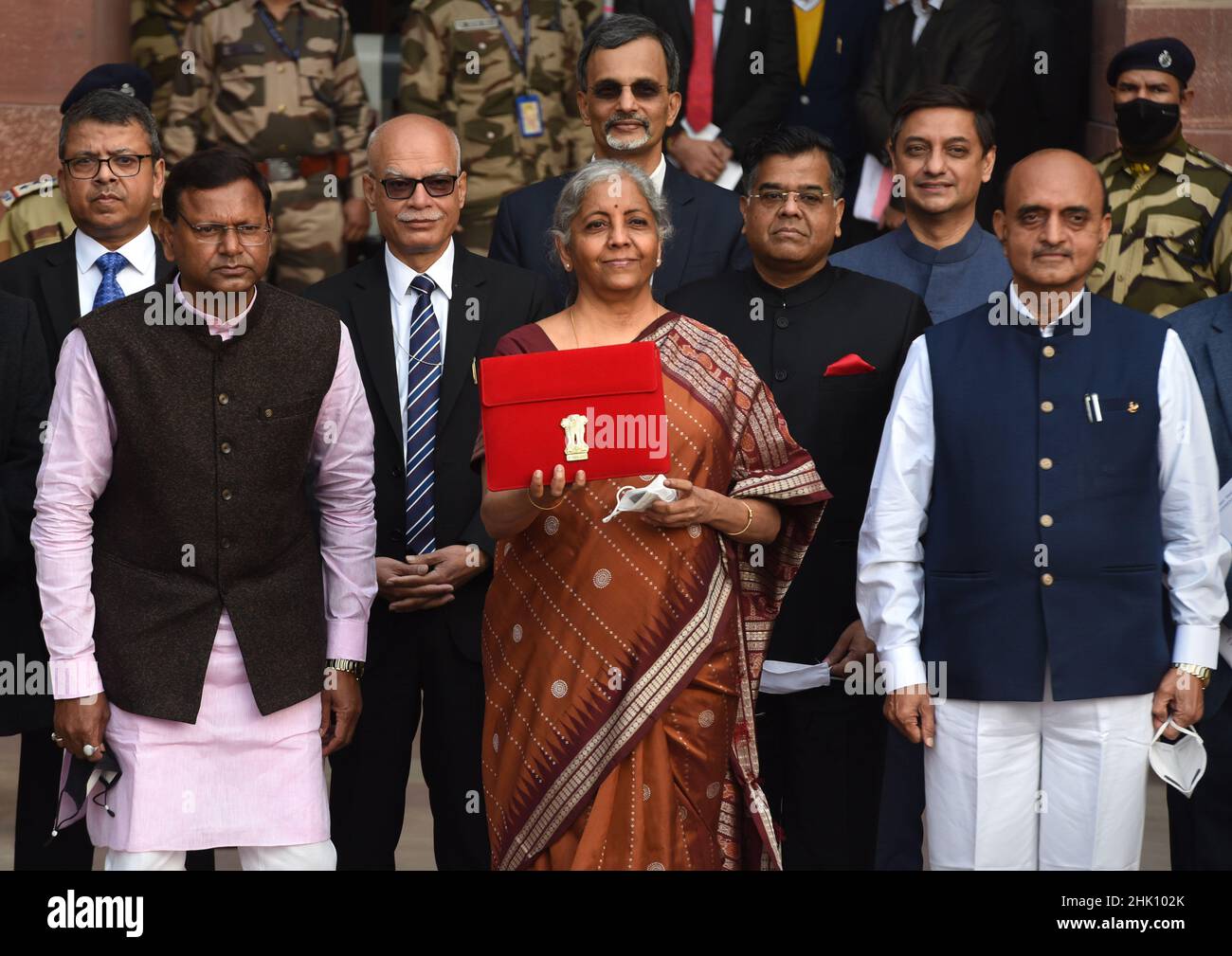 NEW DELHI, INDIA - FEBRUARY 1: Union Minister of Finance Nirmala Sitharaman is seen holding the tab instead of traditional ‘bahi khata' along with MoS Finance Pankaj Chaudhary, Bhagwat Karad and other senior officials before leaving from Ministry of Finance to the Parliament to present Union Budget 2022-23 on February 1, 2022 in New Delhi, India. Nirmala Sitharaman, who presented Union Budget 2022 in Parliament on Tuesday, said that it will lay the foundation for economic growth through public investment as Asia's third-largest economy emerges from a pandemic-induced slump. (Photo by Ajay Agga Stock Photo