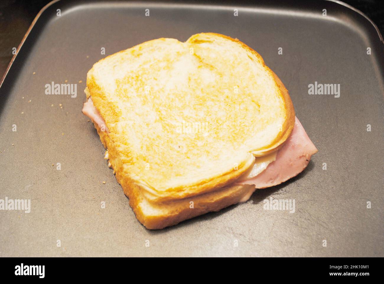 Making a Grilled Ham and Cheese Sandwich Stock Photo Alamy