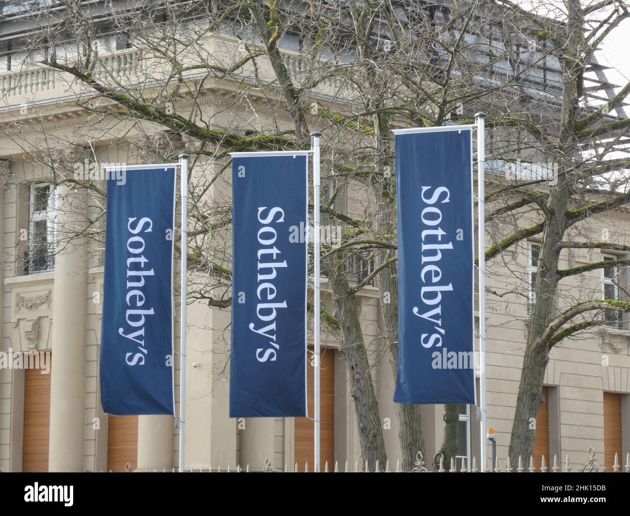 Cologne, Germany. 23rd Jan, 2022. Flags in front of the Cologne branch of Sotheby s auction house in the Palais du Rhin, also called Palais or Villa Oppenheim, a palatial neo-rococo building built in 1908 in the Bayenthal district of Cologne. Sotheby's headquarters in Germany Credit: Horst Galuschka/dpa/Alamy Live News Stock Photo