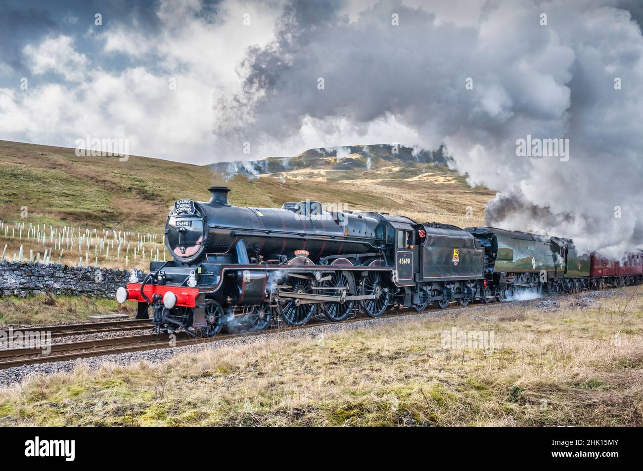 This double header steam train is headed by the LMS Class 6P 4-6-0 #45690 Leander and the SR Battle of Britain Class 4-6-2 #34067 Tangmere Stock Photo