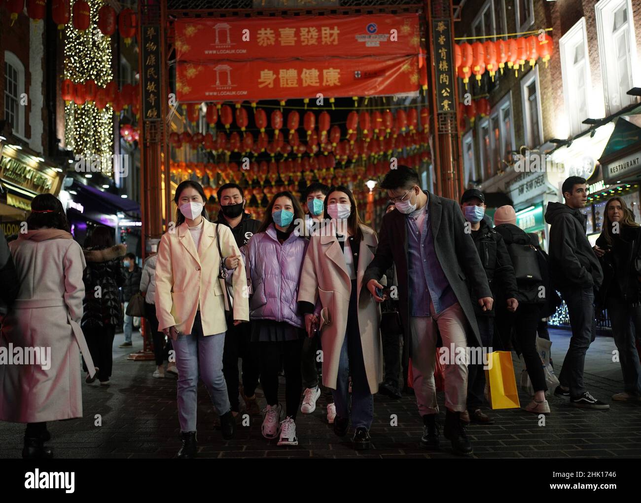 People in Chinatown, London, celebrating the Lunar New Year. The Lunar New Year - beginning on February 1 - is the start of a two-week celebration and is the most important holiday for millions of people around the world. Picture date: Tuesday February 1, 2022. Stock Photo