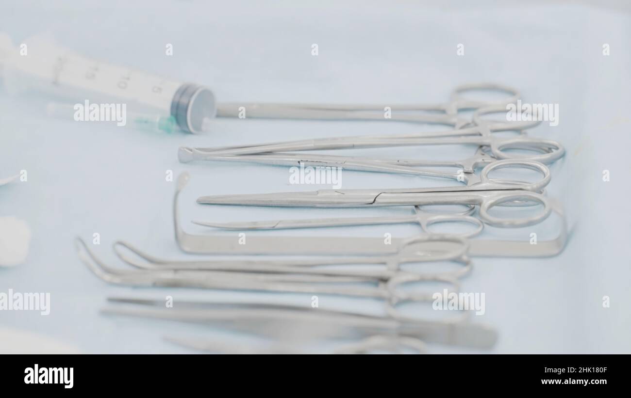 Closeup of surgical instruments. Action. Closeup of surgical