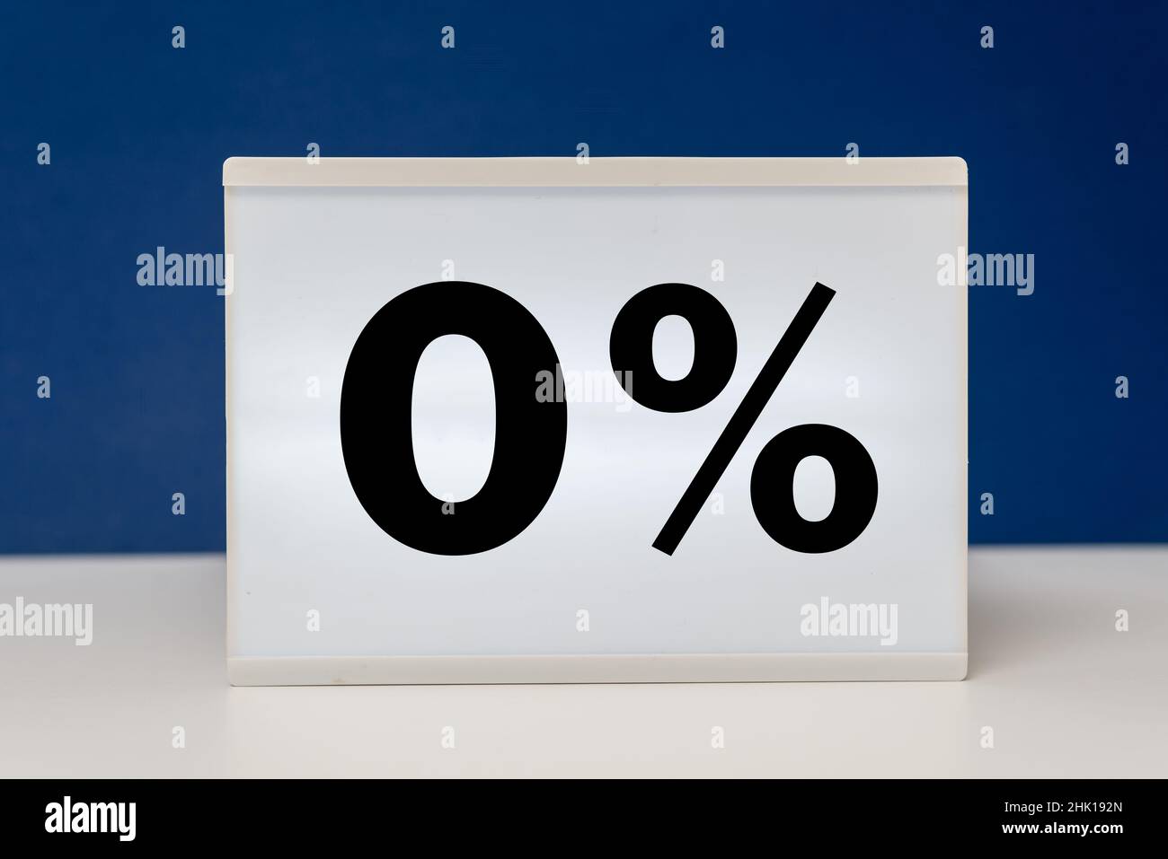 Zero percent on white box with blue background Stock Photo