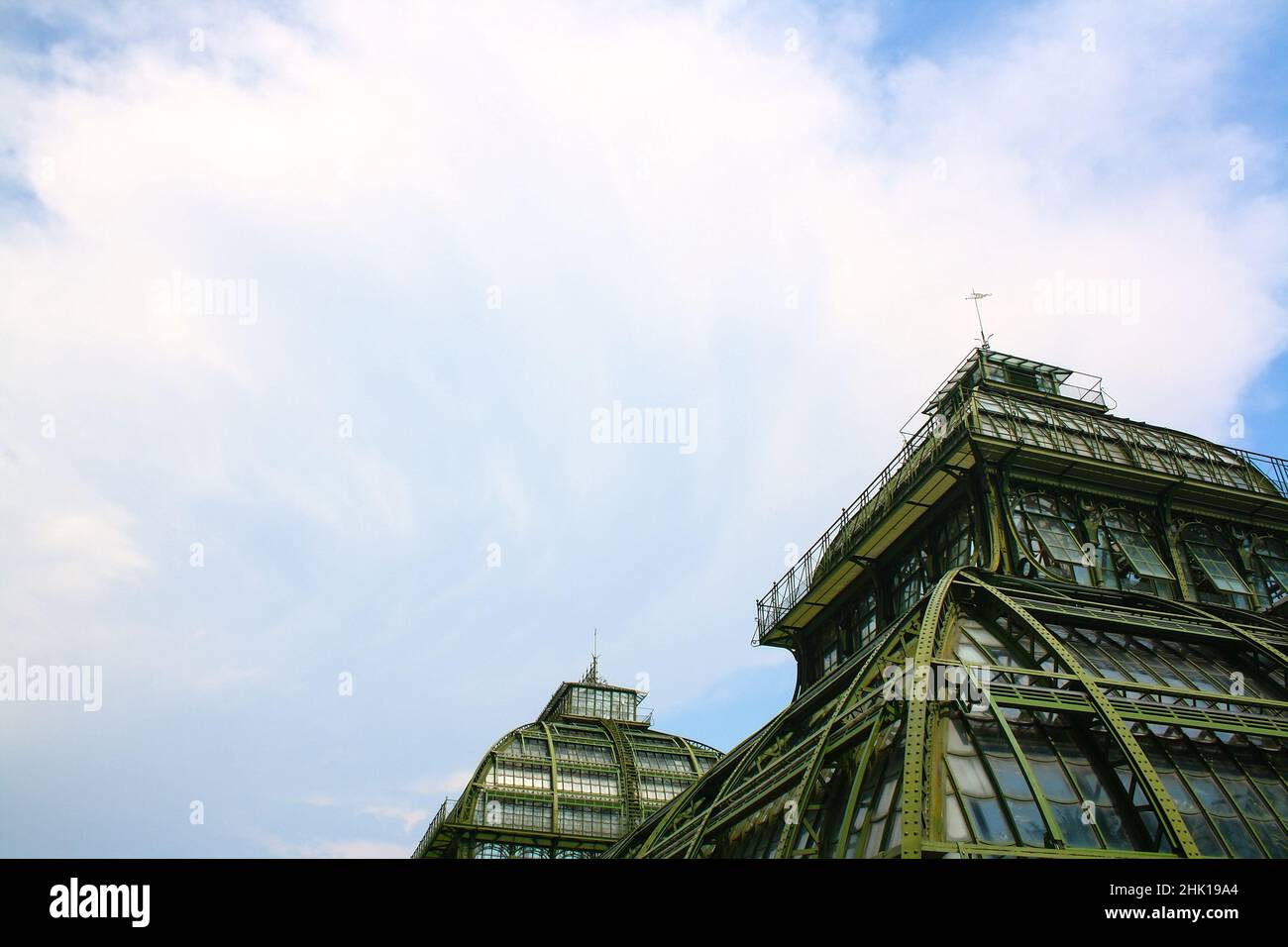Palmenhaus, Vienna, Austria with cloudy sky Stock Photo