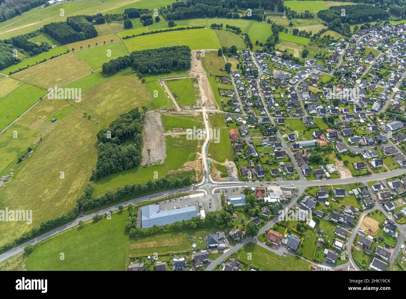 Aerial photograph, construction site new building area An der Wahre, for residential houses, Siegener Straße, Hünsborn, Wenden, Sauerland, North Rhine Stock Photo