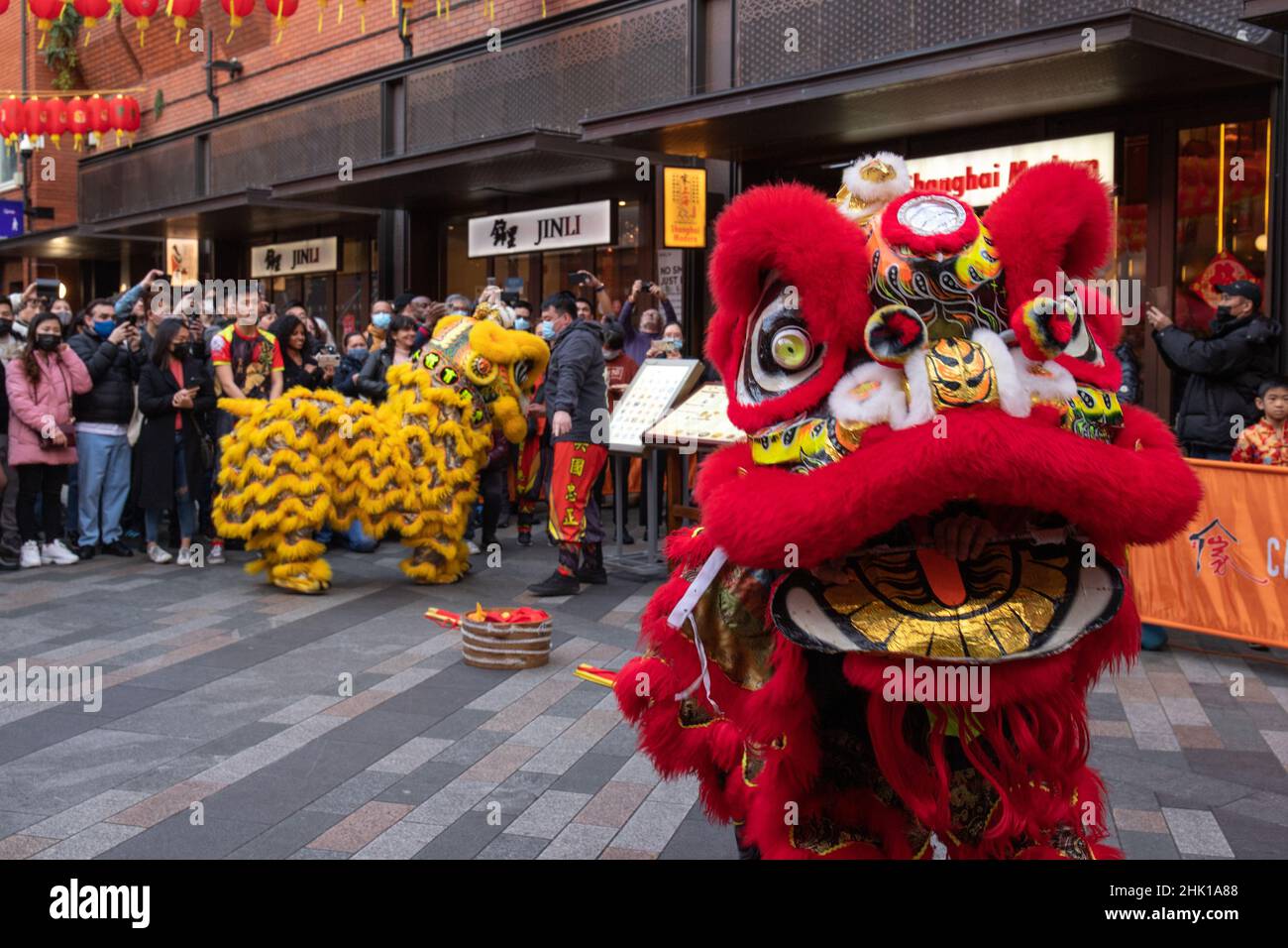London, England, UK 1 February 2022 Crowds gather in China Town to celebrate Chinese New Year, this year visited by Camilla, Duchess of Cornwall and Prince Charles. Chinese dragons and drummers entertain the crowds Stock Photo