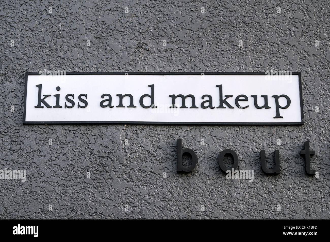 Sign on boutique called Kiss and makeup Stock Photo