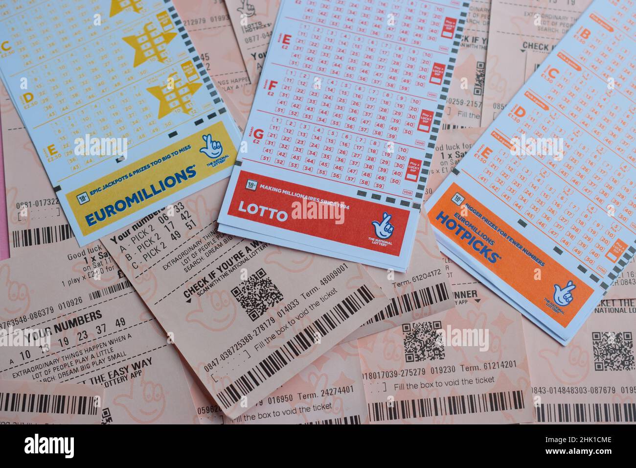 Background with lottery tickets and slips. Stock Photo