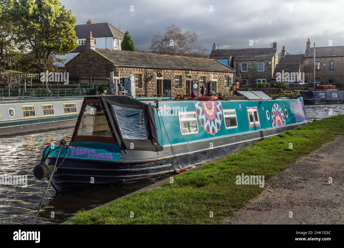 A barge moored on the Leeds Liverpool canal at the top of the Five Rise Locks in Bingley, West Yorkshire. Stock Photo