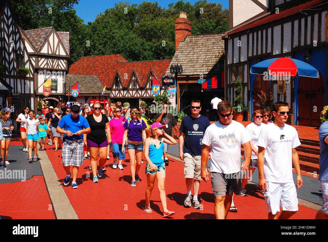 Crowds make their way through a recreated Tudor Village in Busch Gardens, Virginia Stock Photo