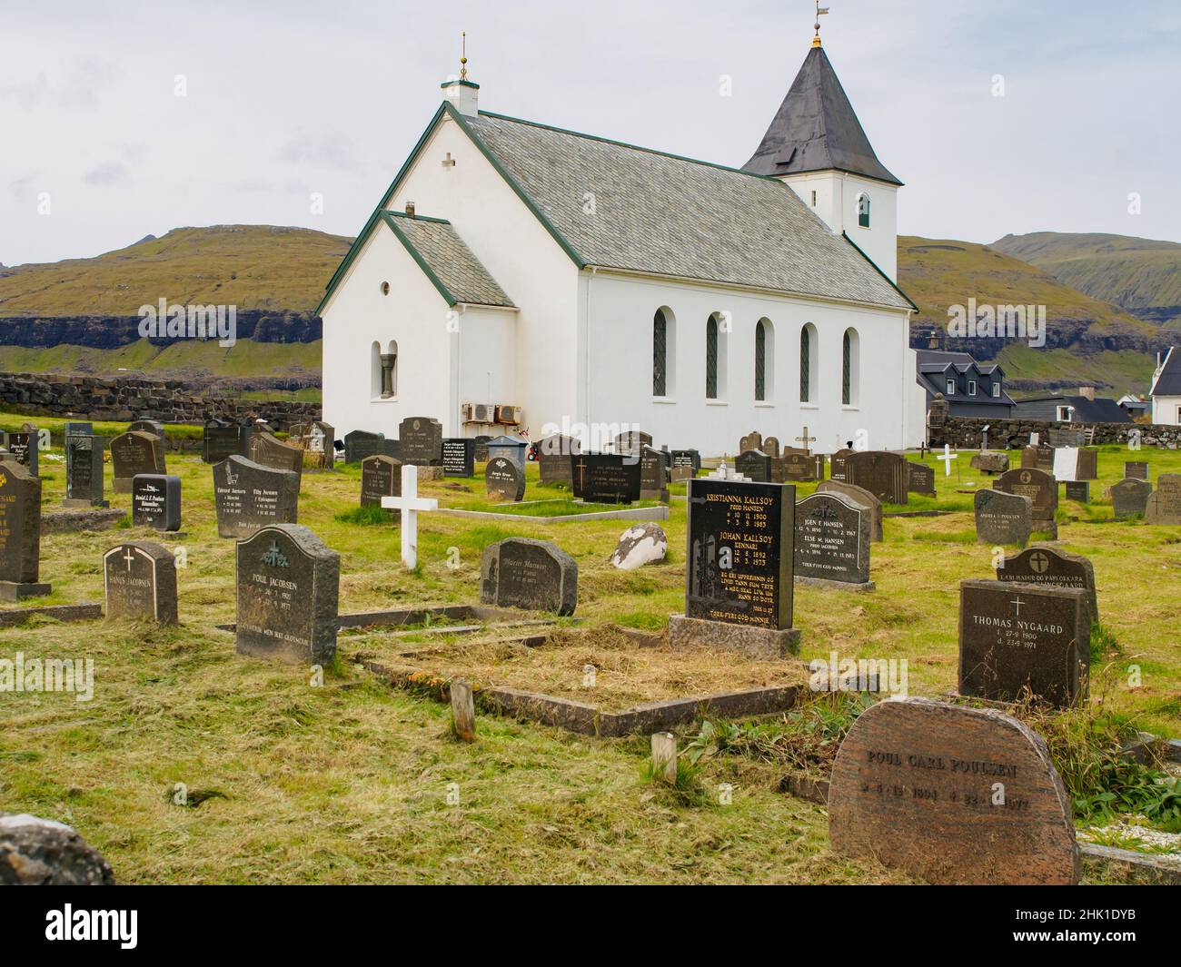Eiði, Ejde, (Oat), Faroe Islands - Sep, 2020: Small church (Eiðis kirkja) and cemetery in the village on Island Eysturoy,  Denmark Stock Photo