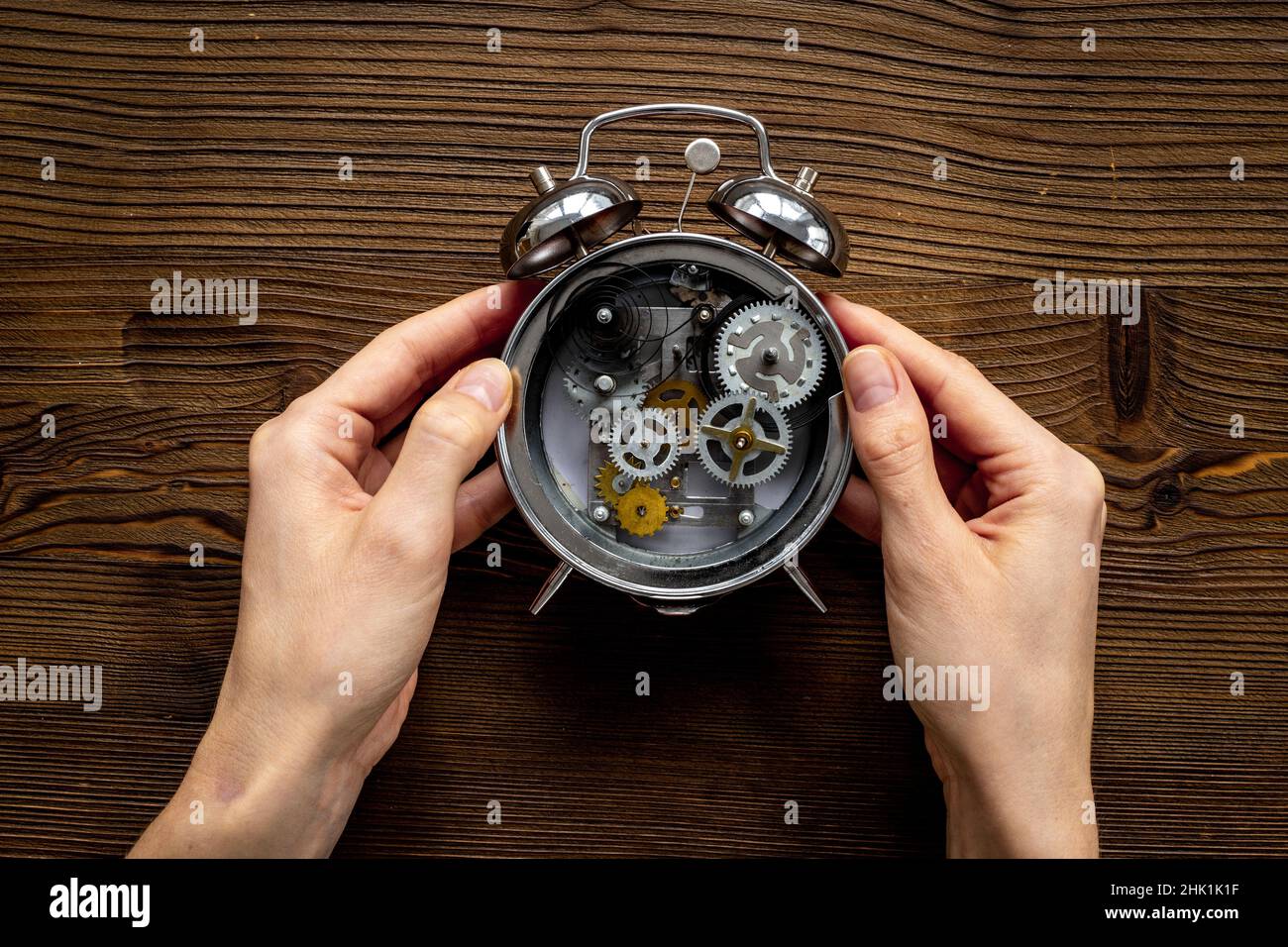 Watch mechanism with gears and wheels close up. Alarm clock mechanism Stock Photo Alamy