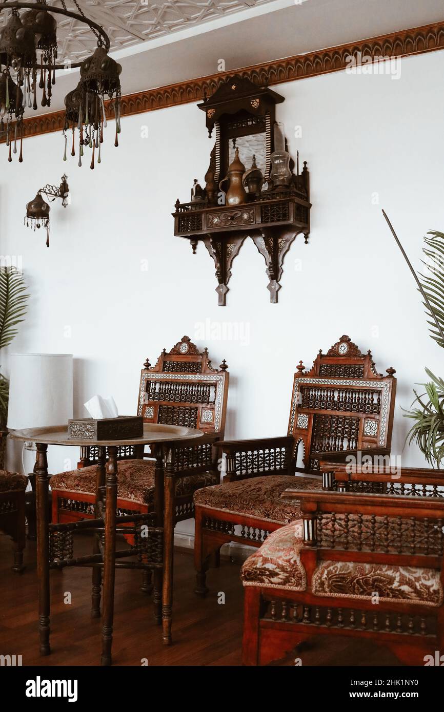Egyptian guest room with wooden arabic interior chairs and table Stock