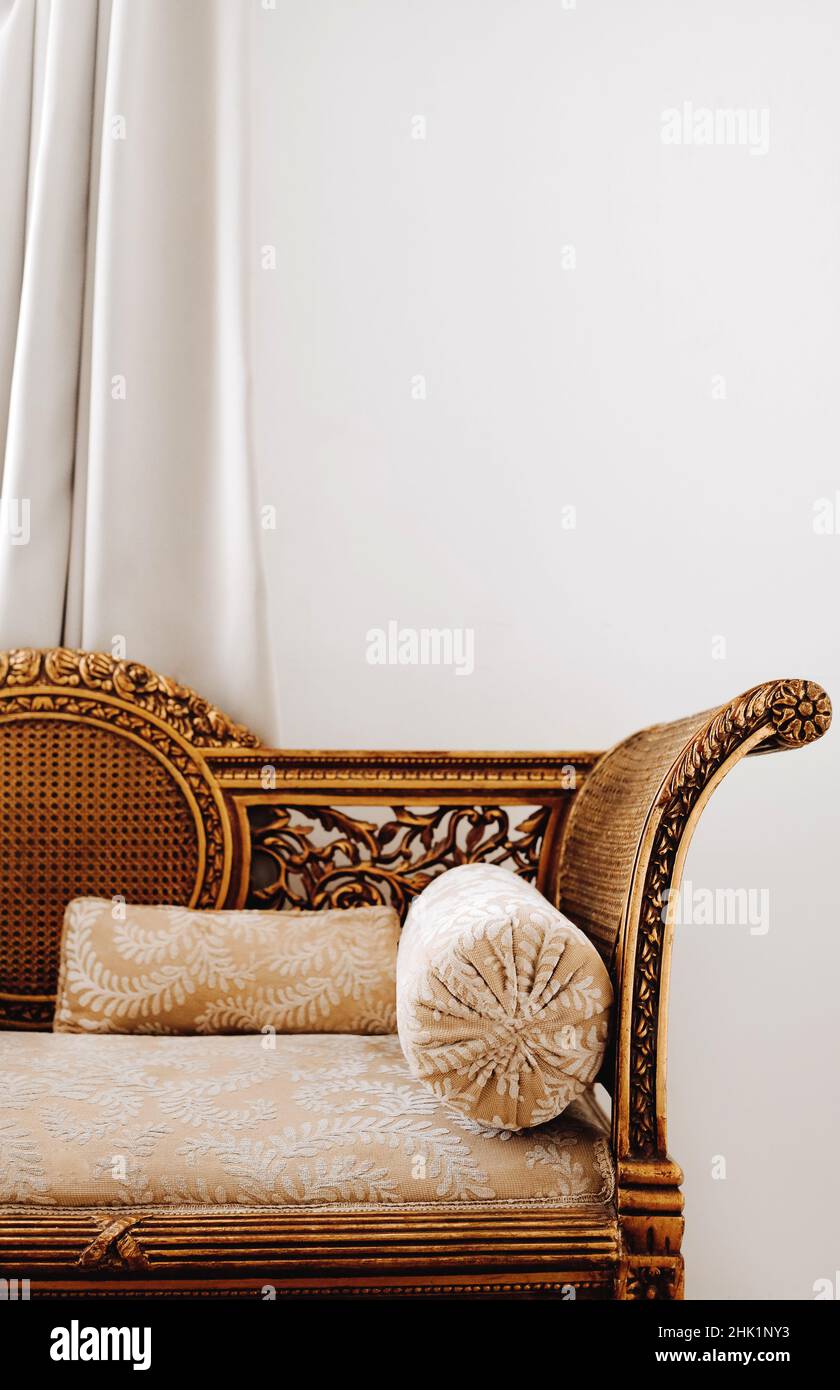 Antique arabic egyptian interior with gilded sofa and pillow Stock Photo