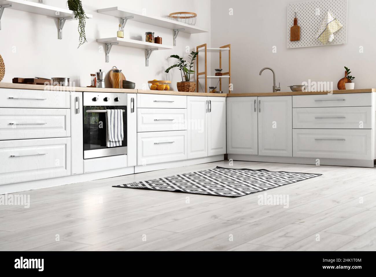 Interior of modern kitchen with stylish counters Stock Photo - Alamy