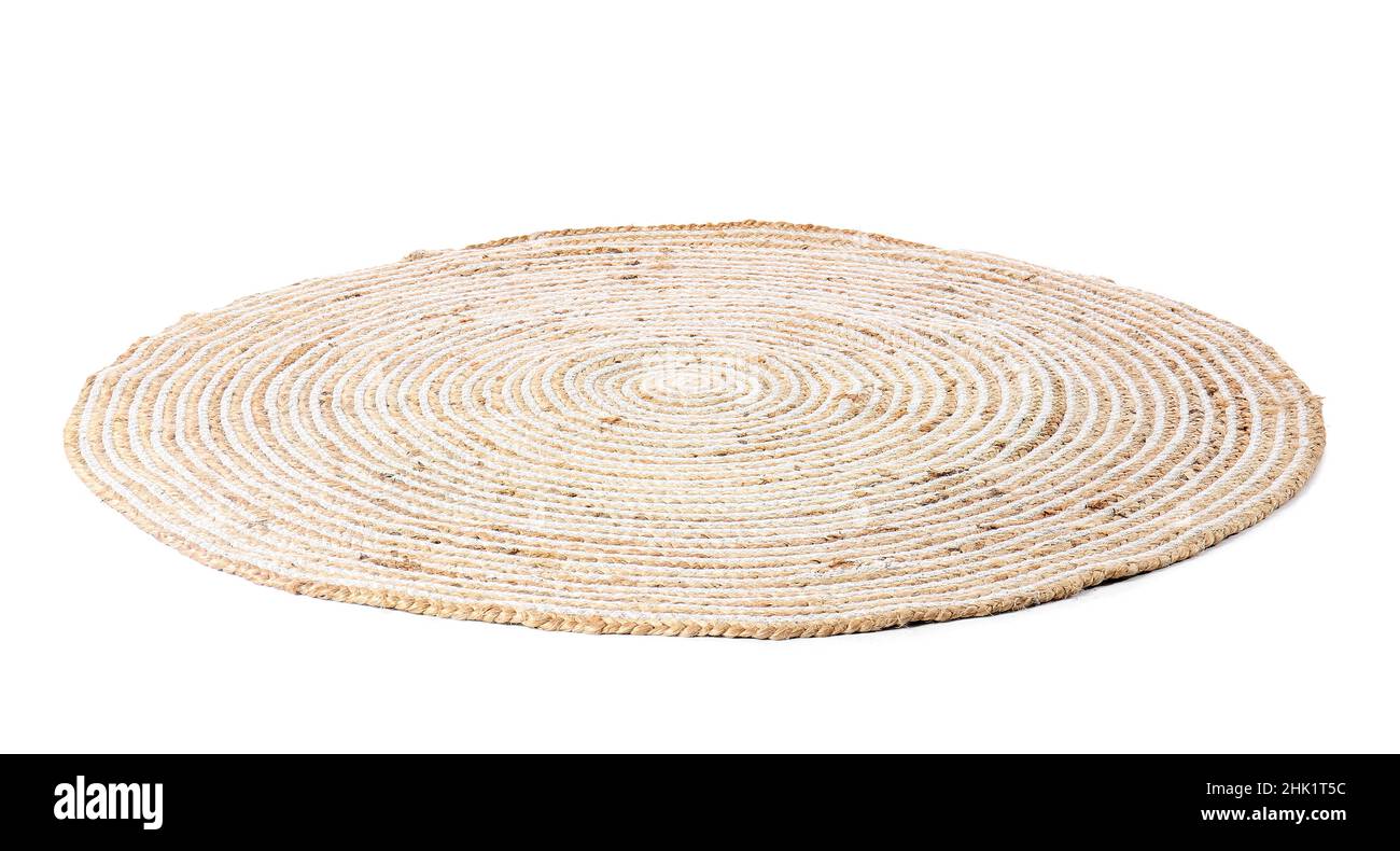 Modern wicker carpet on white background Stock Photo - Alamy