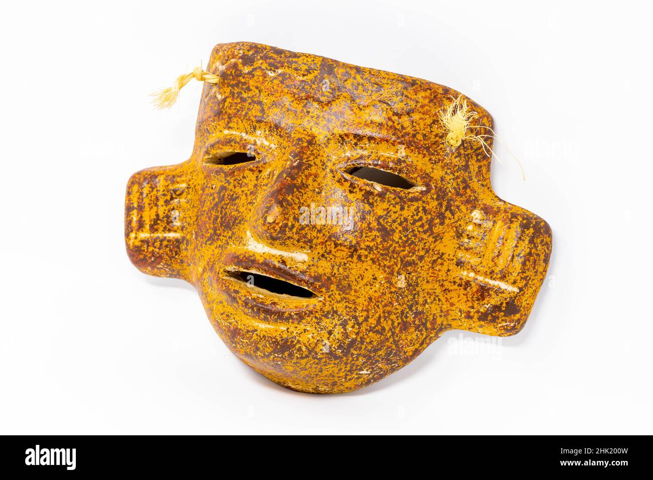 Traditional aztec ceramic face mask decorative isolated Stock Photo