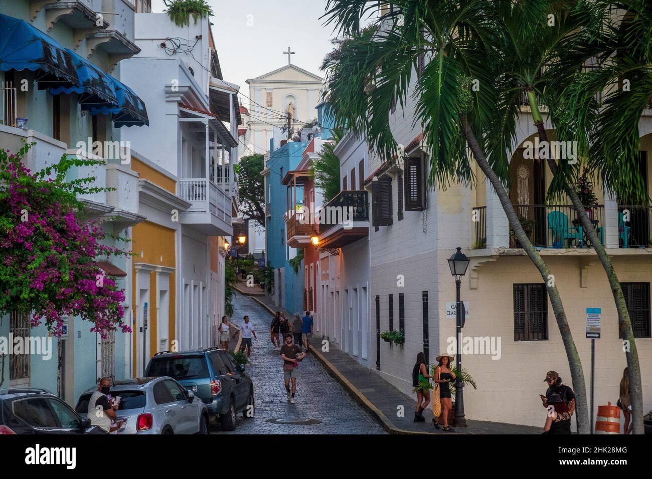 Pedestrians walk on Caleta de las Monjas, San Juan, Puerto Rico Stock Photo  - Alamy