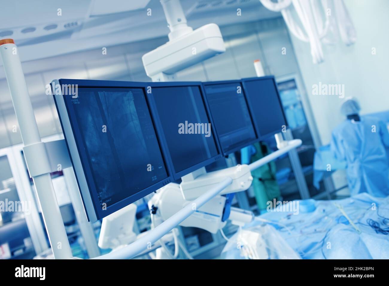 X-ray and life support control of patient during surgical opartion. Stock Photo