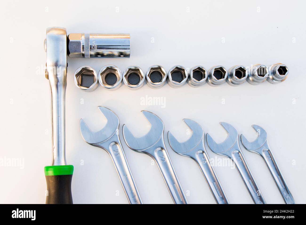 Large group of wrenches, professional kit, different metal wrenches on