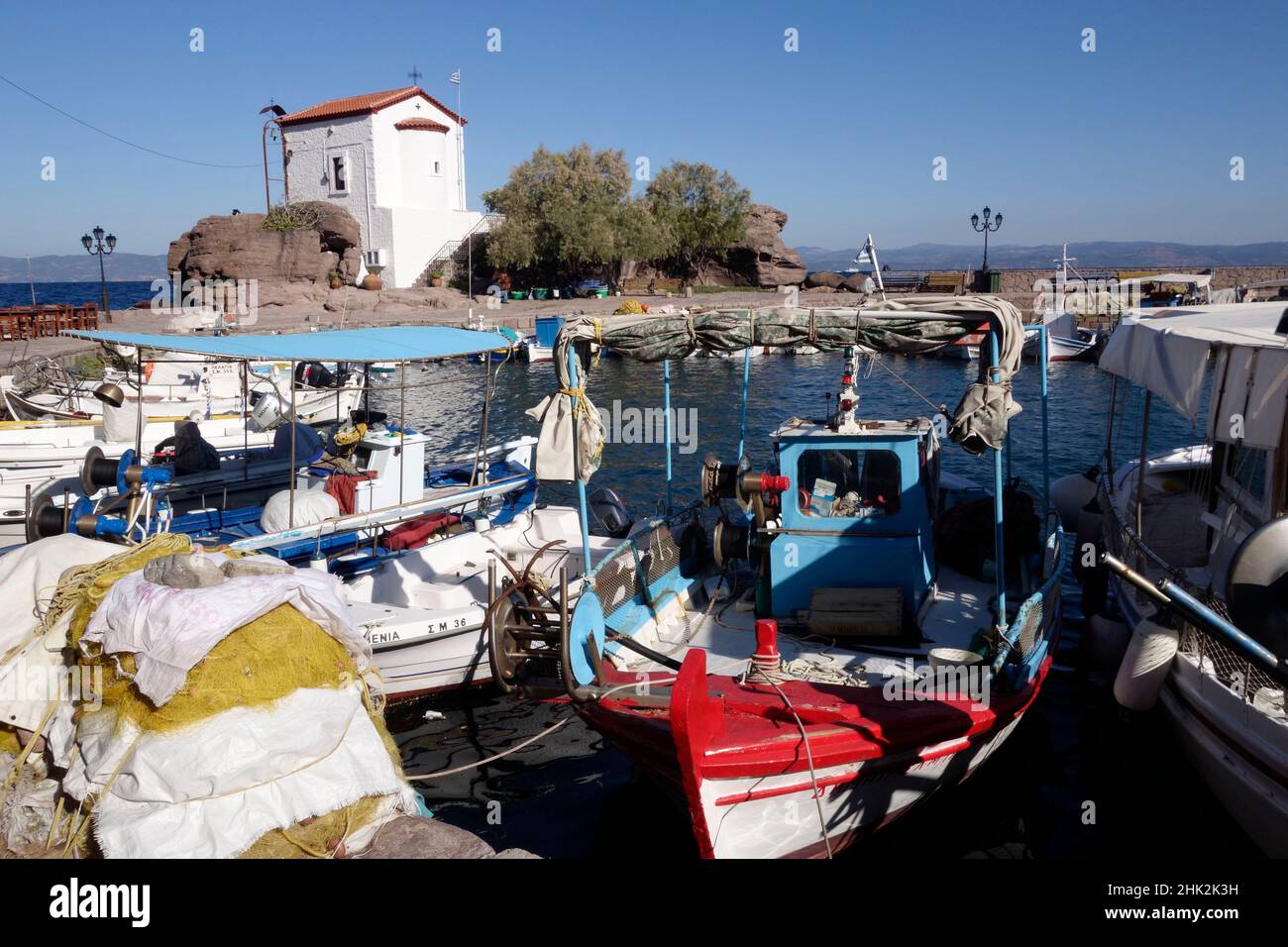 Skala Sykaminias Village Harbour and The church of Panayia Gorgona. Lesvos. Greece Stock Photo