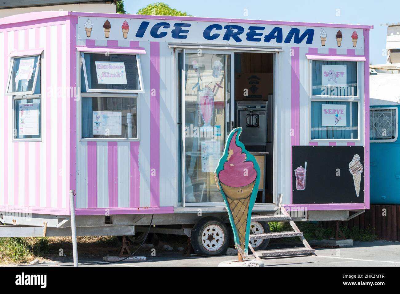 ice cream mobile kiosk which is open for business with no people concept small business enterprise in South Africa Stock Photo