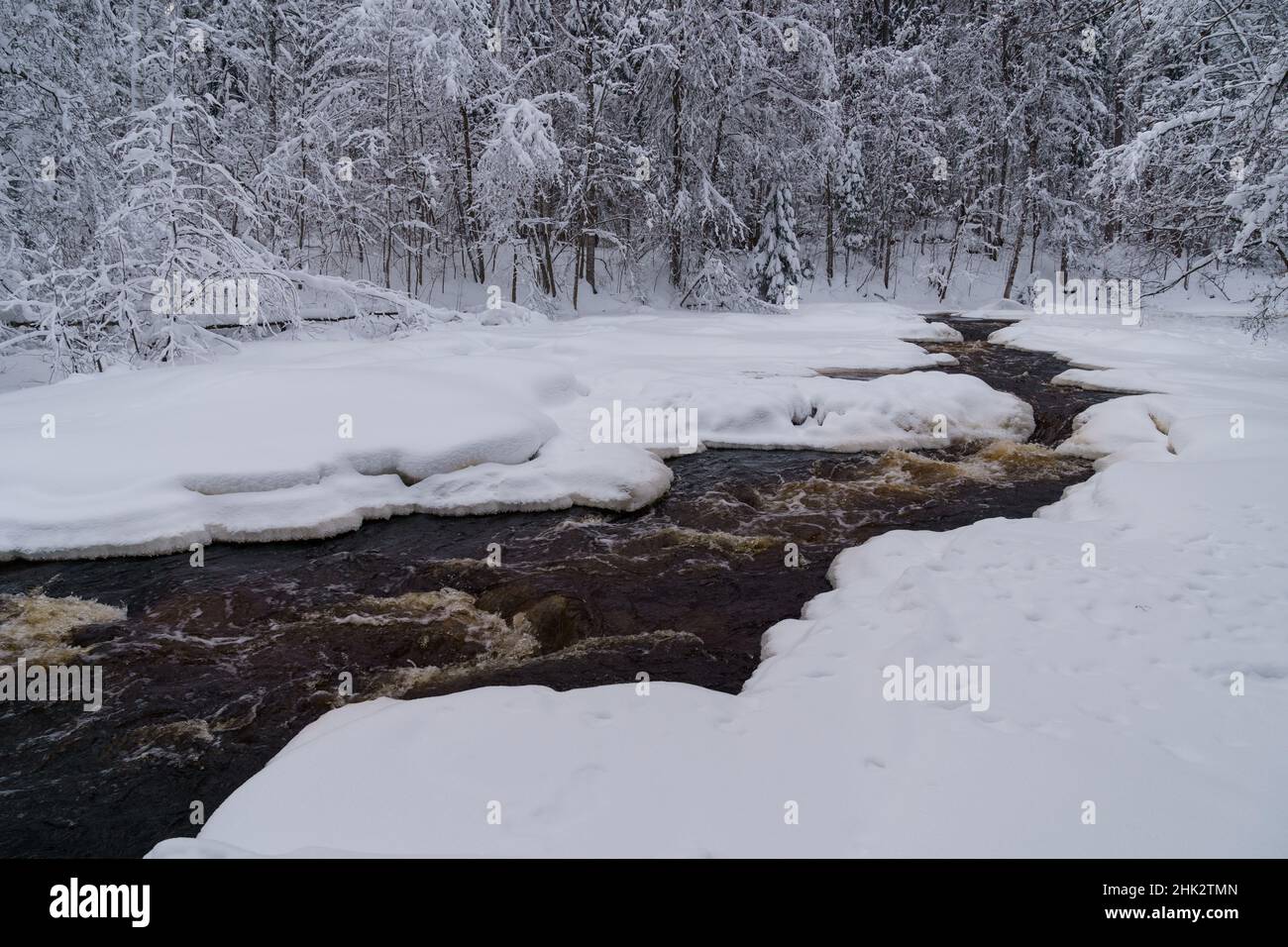 Ice Cold Rushing Rivers Running raging river with melted mountain water washing icy shores of ...
