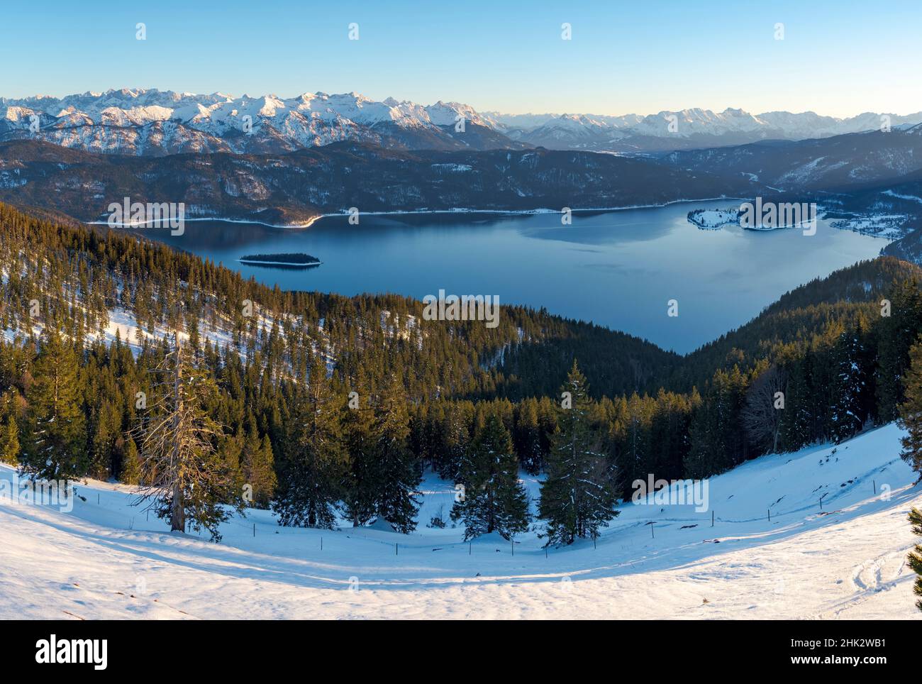 View towards lake Walchensee and the Karwendel mountain range. View from Mt. Jochberg near lake Walchensee during winter in the Bavarian Alps. Germany Stock Photo