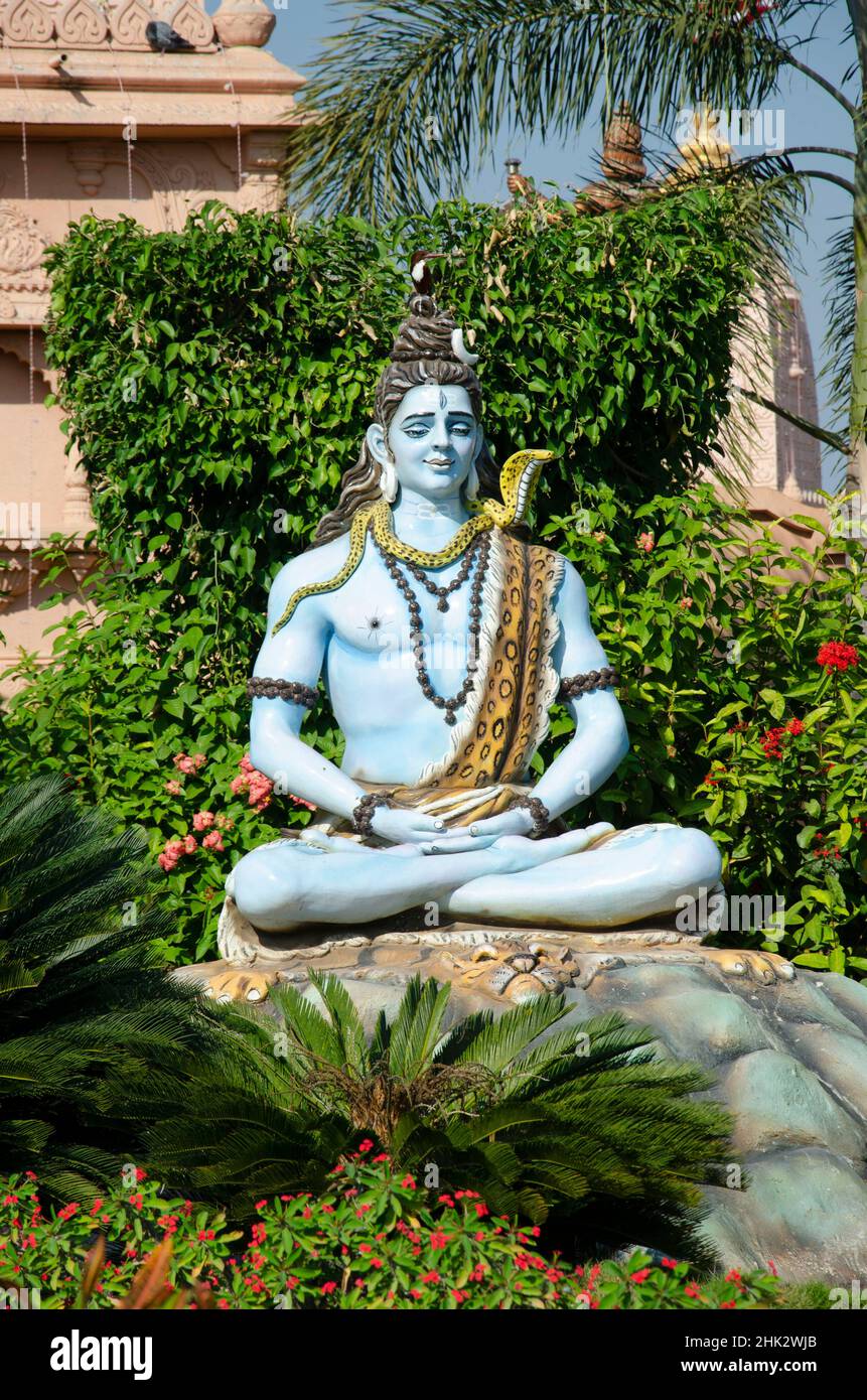 Lord Shiva as Yogi in Dhyana Mudra in garden of Nilkanthdham, Swaminarayan temple, Poicha, Gujarat, Stock Photo