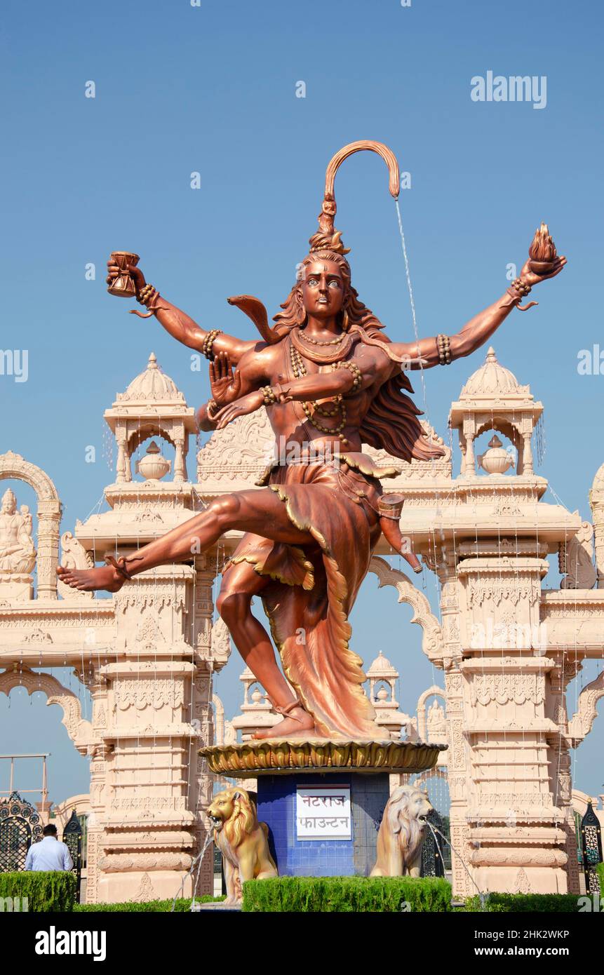 Statue of Dancing Shiva as Nataraja at gate of Nilkanthdham, Swaminarayan temple complex, Poicha, Poicha, Gujarat, India Stock Photo