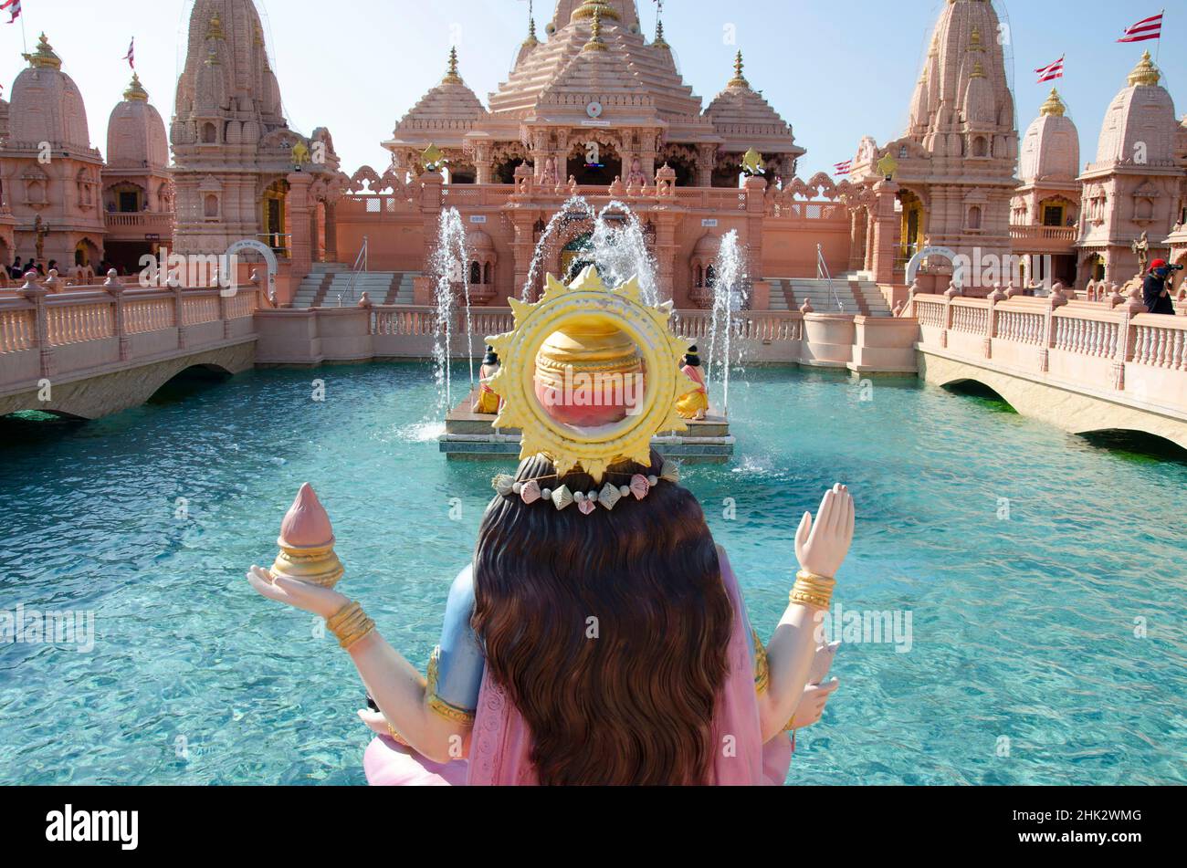 Goddess Narmada overseeing the Neelkanth Sarovar, artificial pond and Sandstone mandaps, Neelkanth Dham Swaminarayan Temple, Poicha, Gujarat, India, l Stock Photo