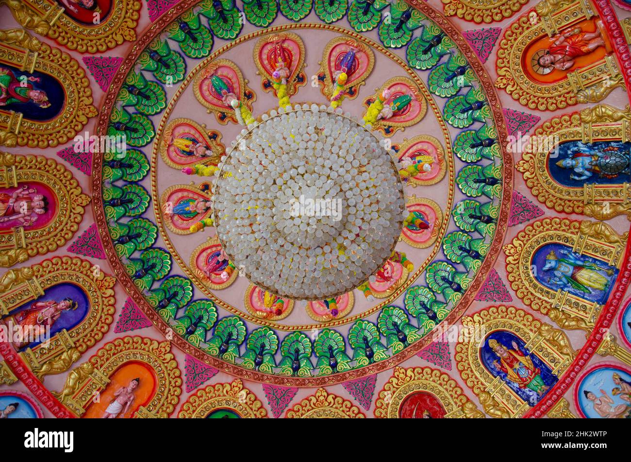 Interior ceiling of Swaminarayan temple with gods, deities and dancing figures carved on the same. Nilkanthdham, Poicha, Gujarat, India Stock Photo