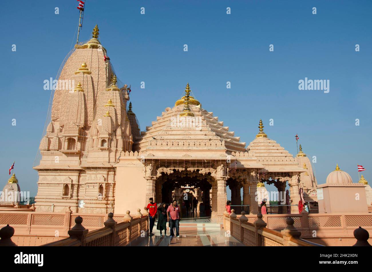 Temples at Nilkanthdham an extensive religious complex with pagodas, fountains, statues & carved idols and gates, located at Poicha, Gujarat, India Stock Photo