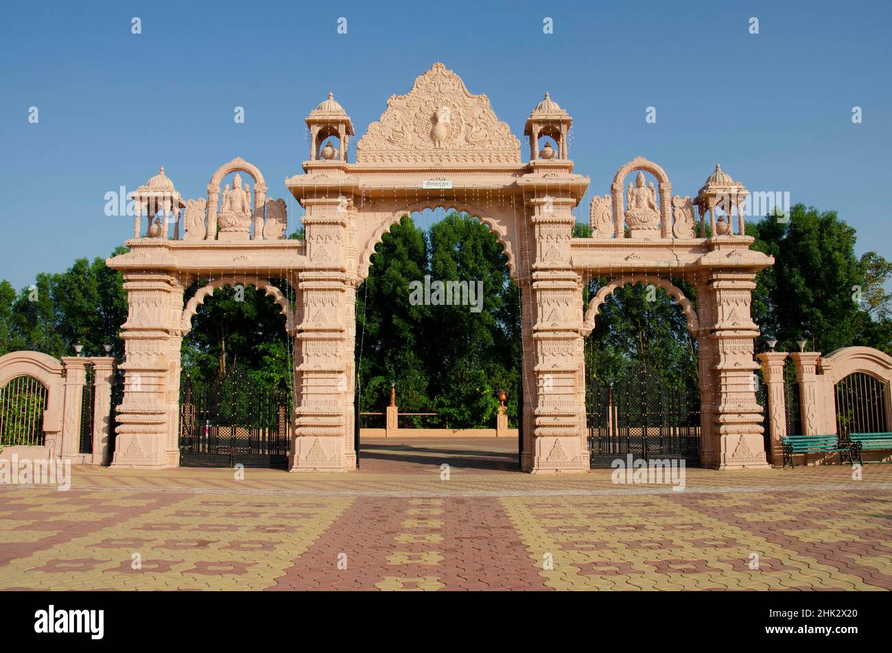 Carved Gateway at Nilkanthdham, Swaminarayan temple Poicha, Gujarat, India Stock Photo