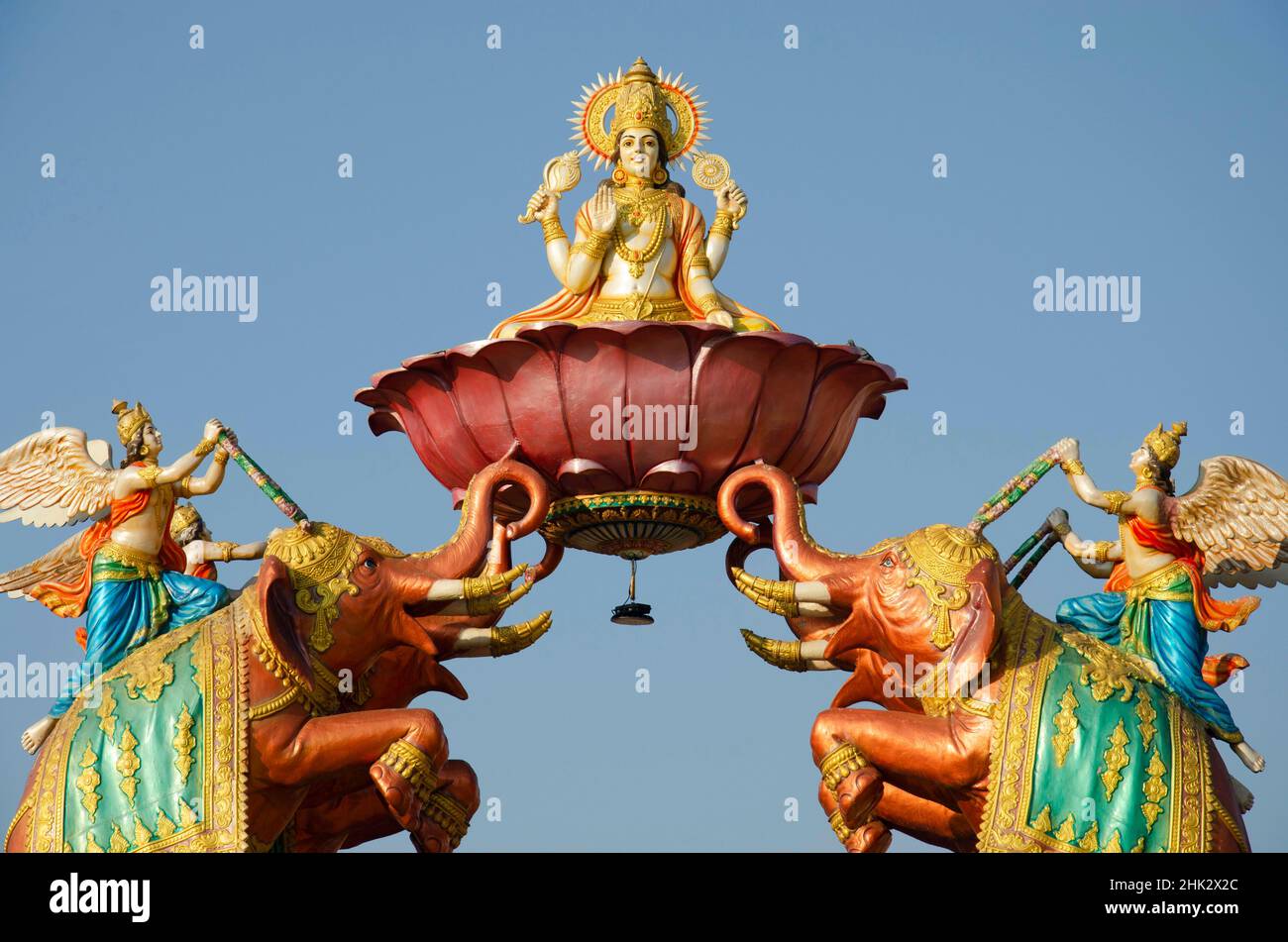 Gajalaxmi flanked by elephants at entrance gate of Nilkanthdham, Swaminarayan temple, Poicha, Gujarat, India Stock Photo