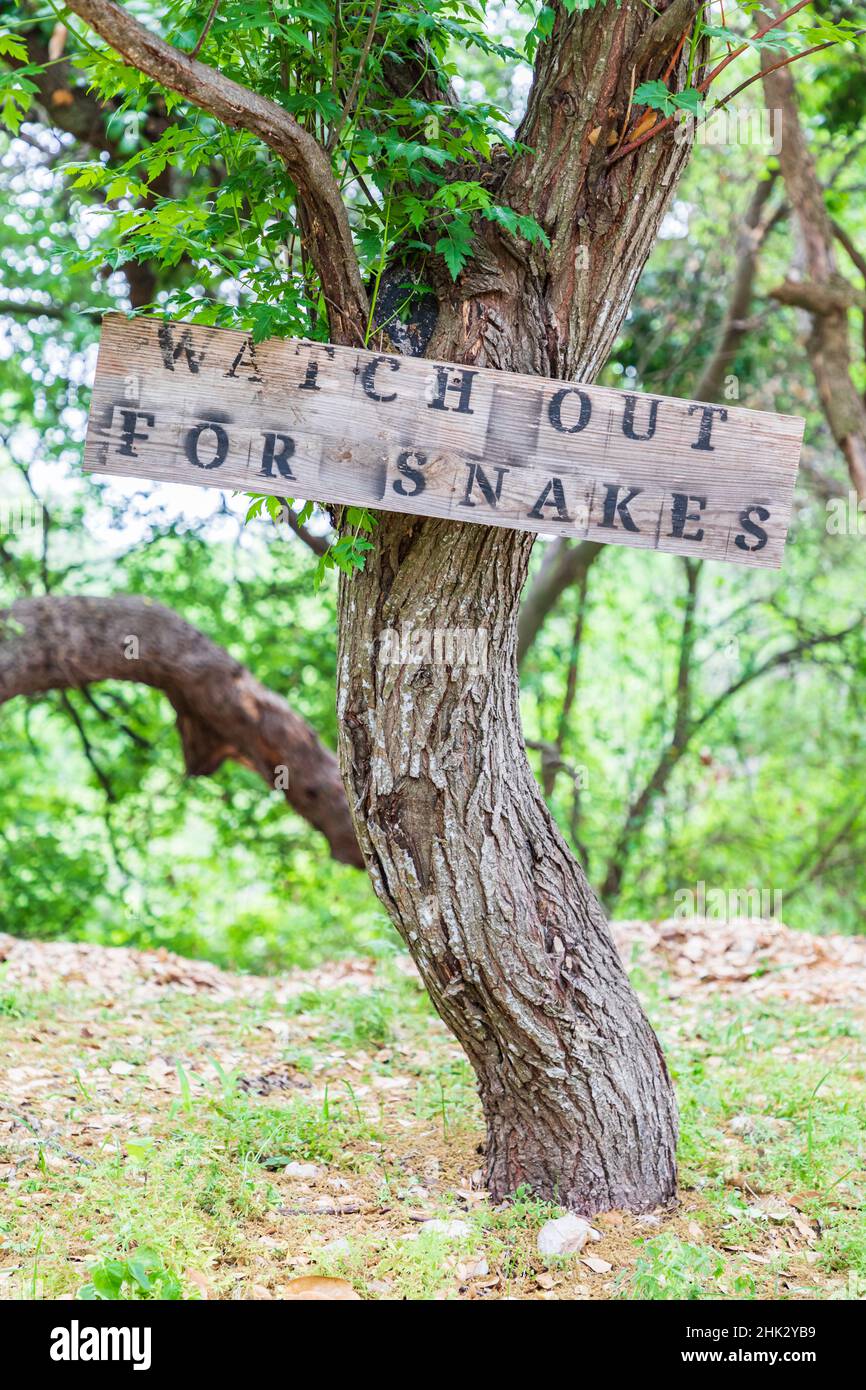 Castroville, Texas, USA. Sign warning snakes in the Texas Hill Country. (Editorial Use Only) Stock Photo