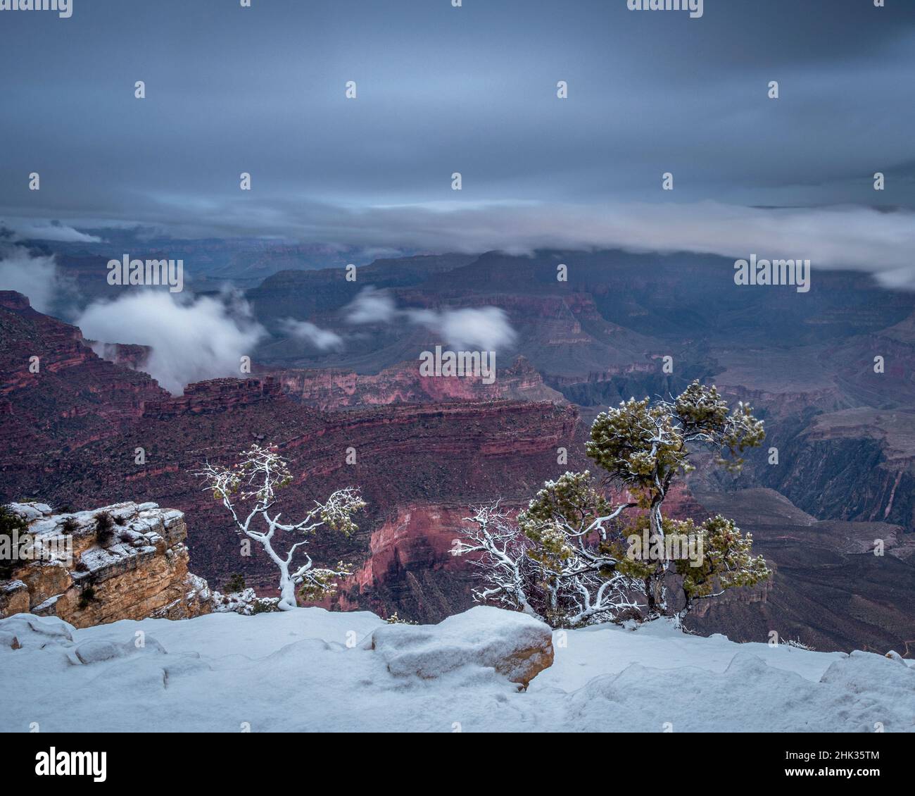 USA, Arizona, Grand Canyon. Stormy sky over canyon landscape at sunset. Stock Photo