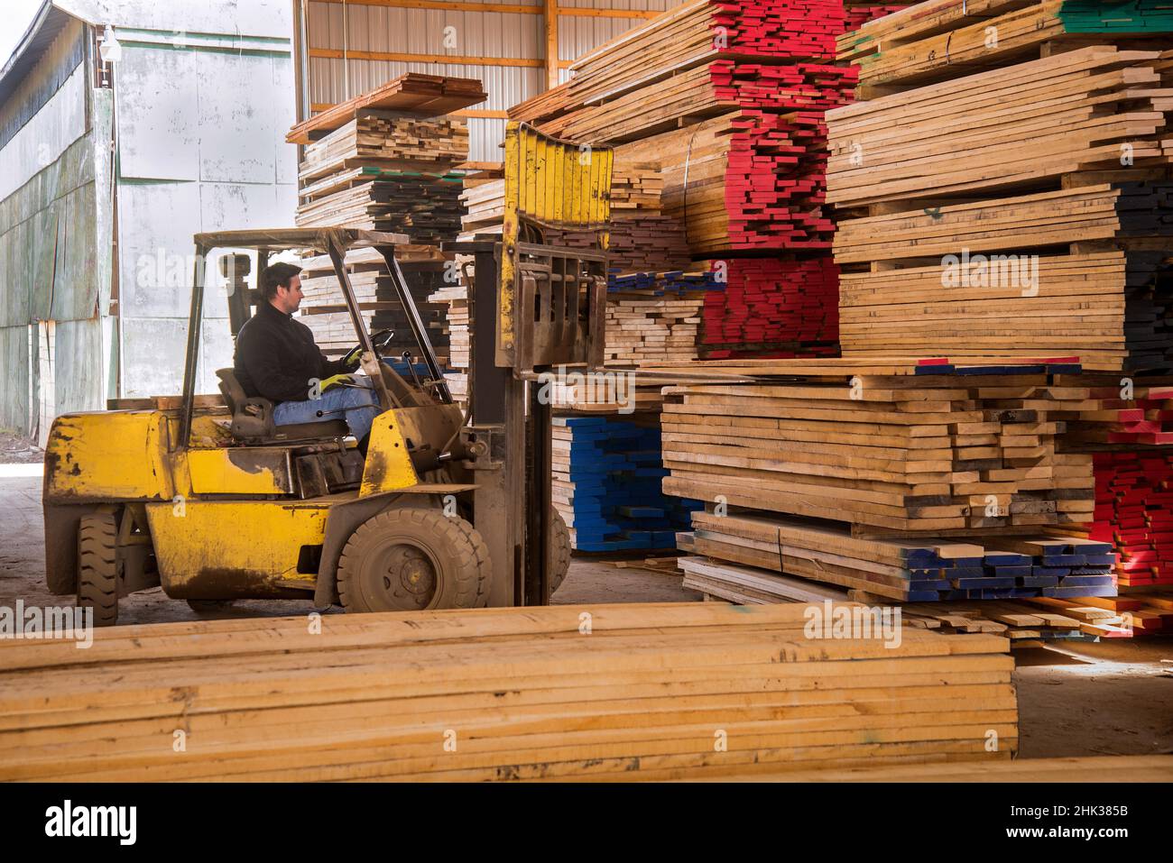 Raw lumber bundles for processing into finshed wood Stock Photo Alamy