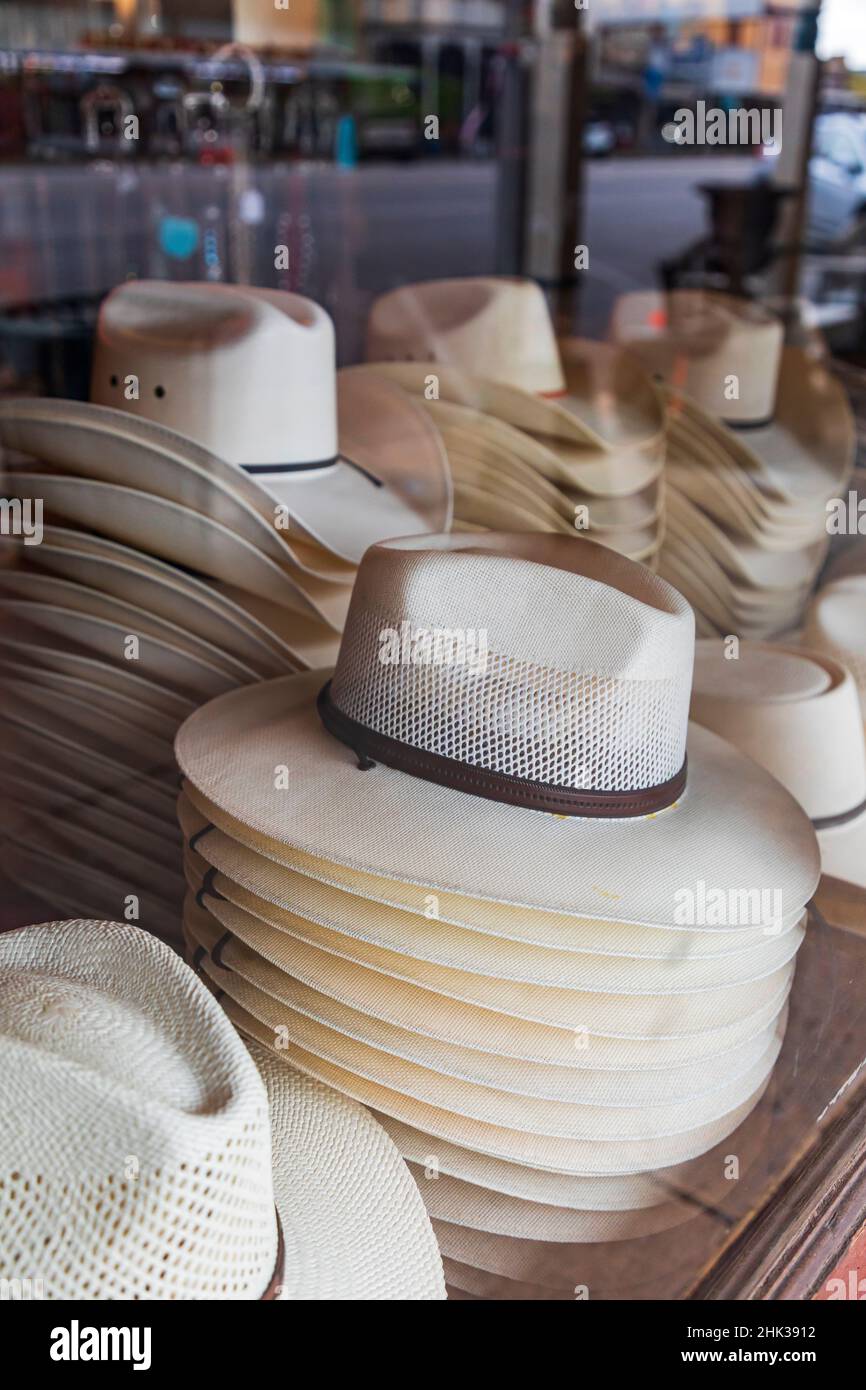 Fredericksburg, Texas, USA. Cowboy hats in a storefront window in the