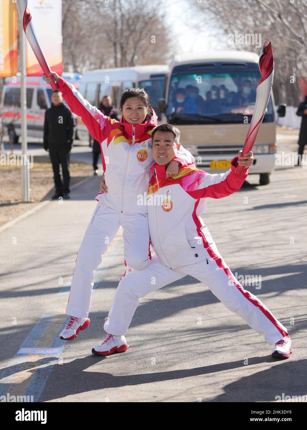 Beijing, China. 2nd Feb, 2022. Torch bearers Wang Luming (R) and Yang ...
