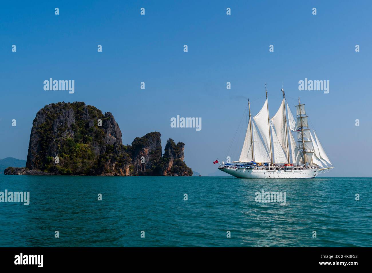 Star Clipper Cruise Ship Sailing In Phang Nga Bay Thailand Stock Photo star-clipper-cruise-ship-sailing-in-phang-nga-bay-thailand-stock-photo