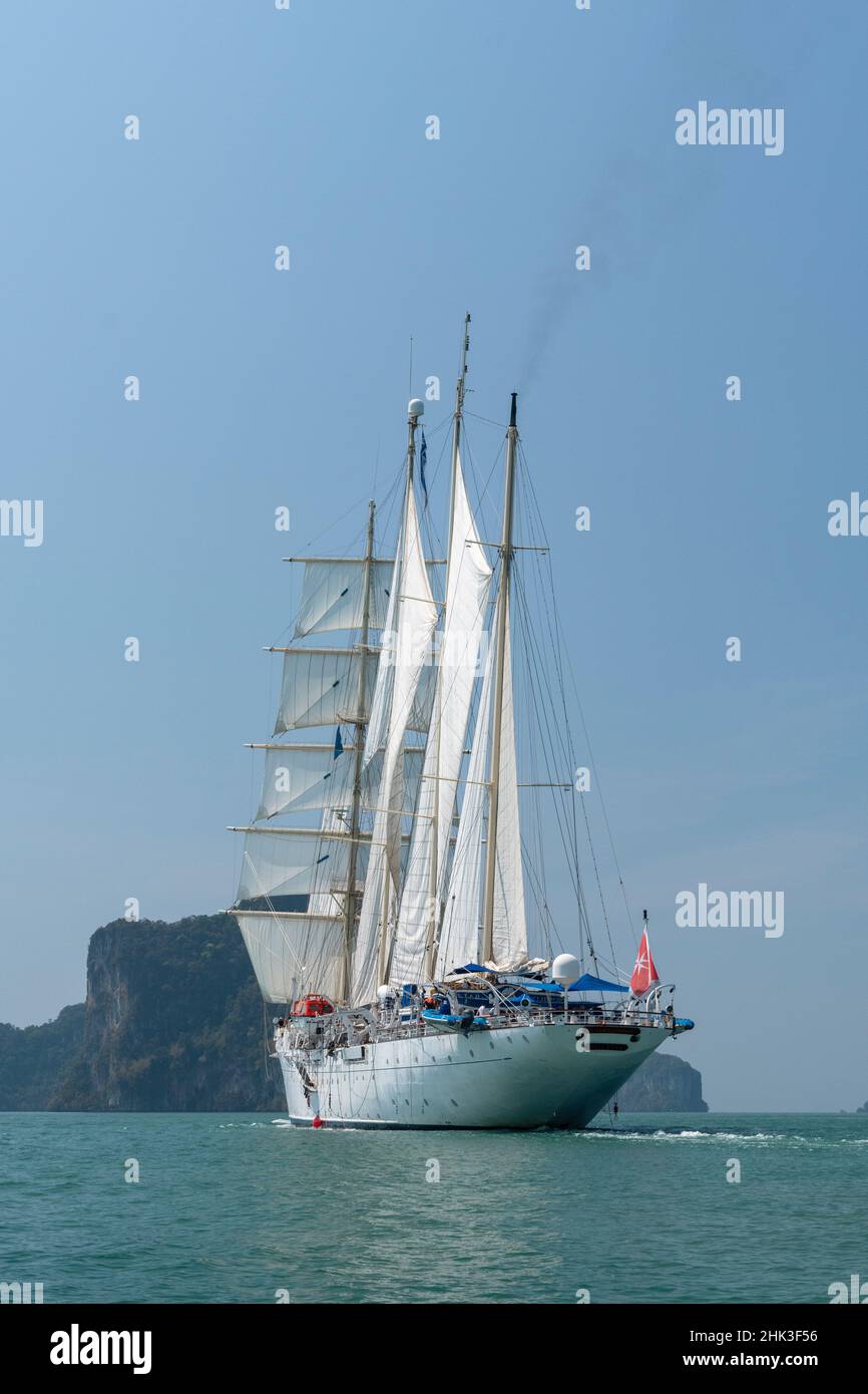 Star Clipper Cruise Ship Sailing In Phang Nga Bay Thailand Stock Photo star-clipper-cruise-ship-sailing-in-phang-nga-bay-thailand-stock-photo