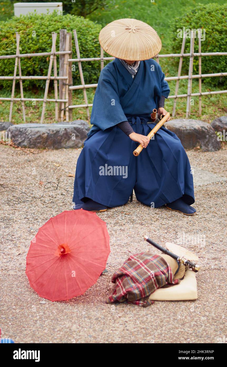 Samurai with performing dog in a park in Kyoto Stock Photo - Alamy